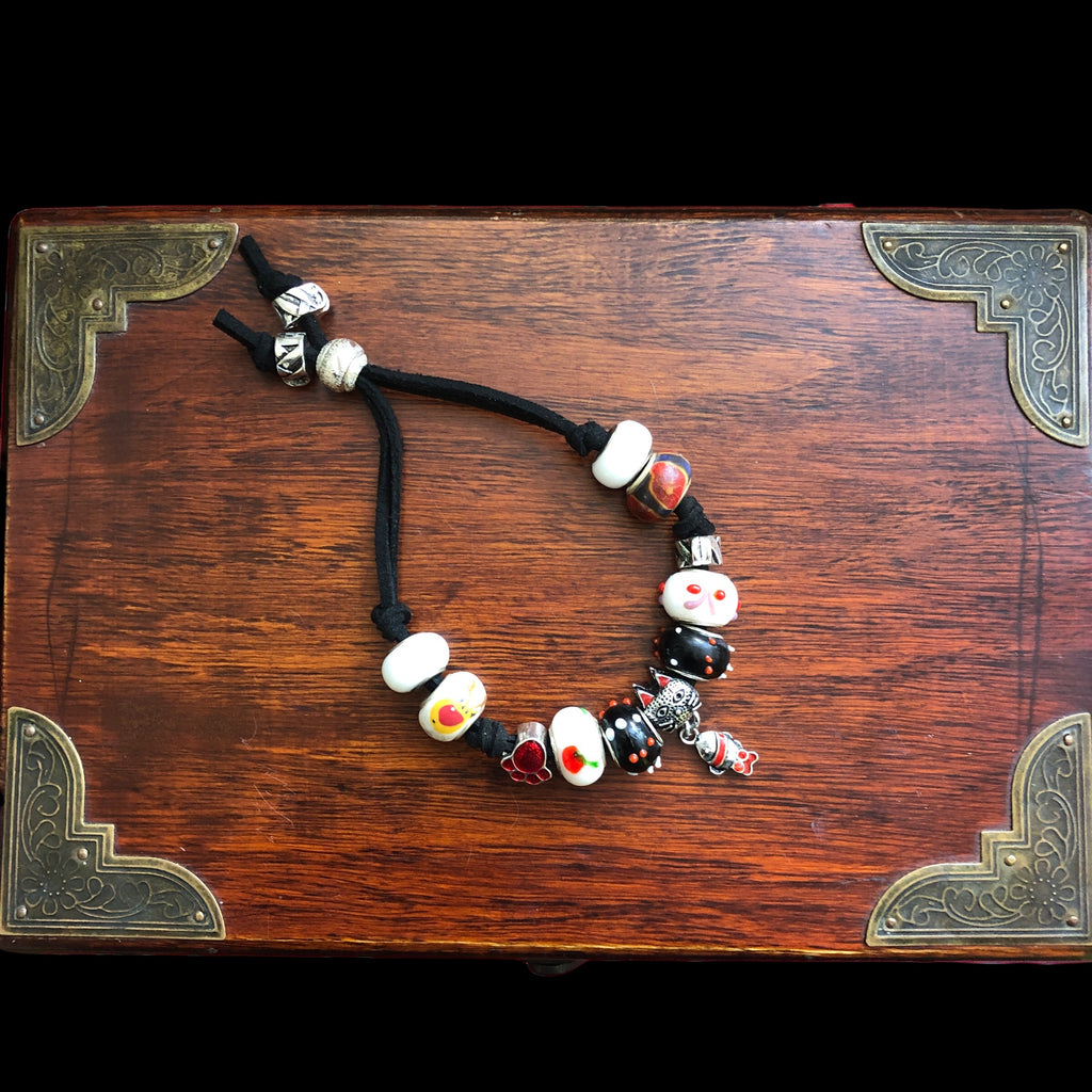 Red and White Glass Charm Bracelet