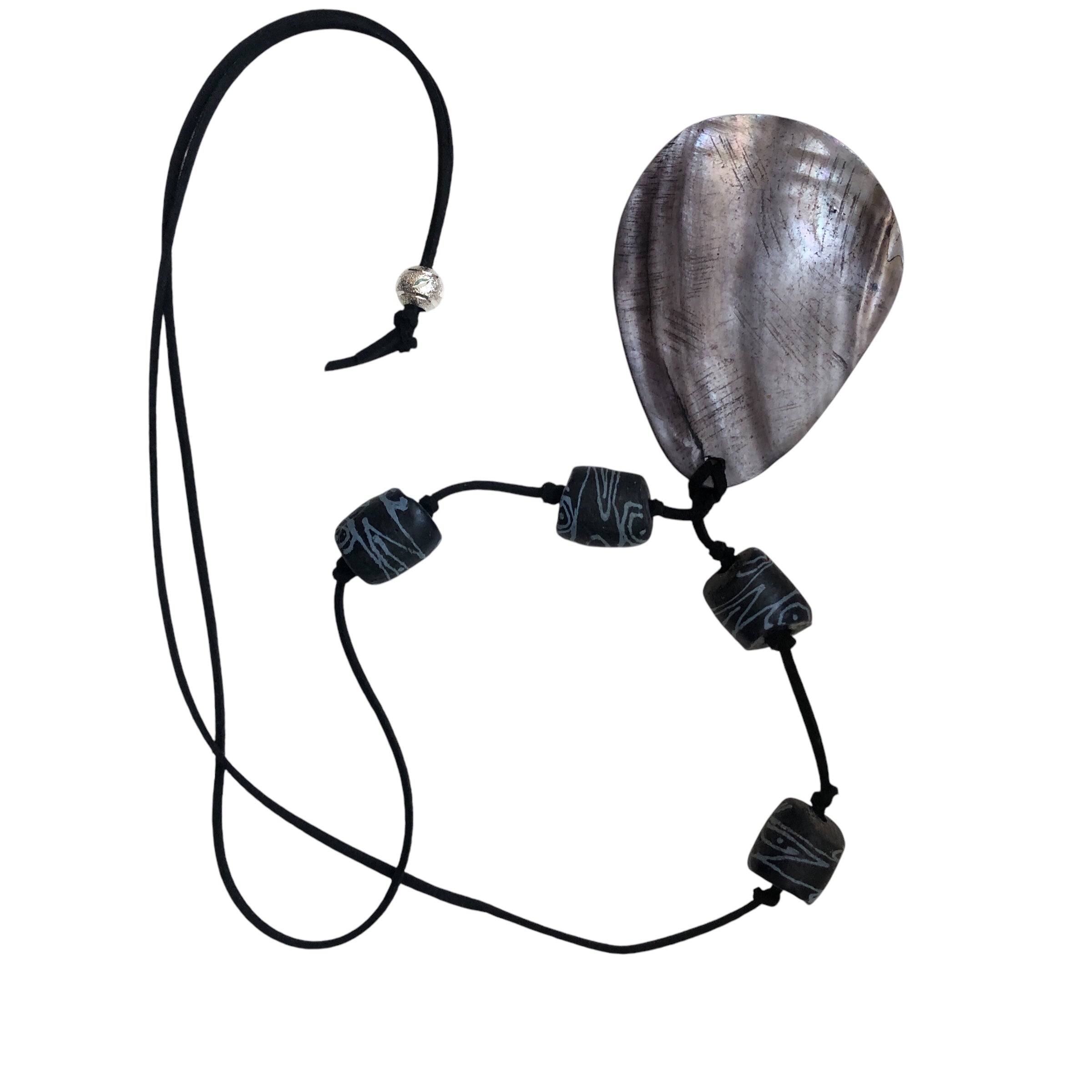 necklace with a large Mother of Pearl drop pendant and Gotland glass beads, on a black suede strap.