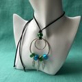 Pendant Necklaces with Blue and Green Glass Charms